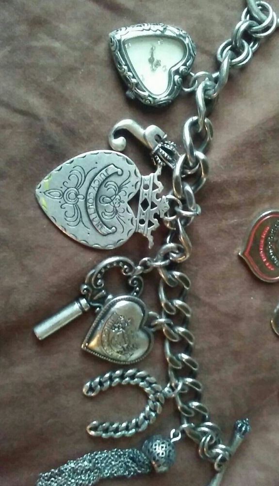 Retired Juicy Couture time piece charm bracelet